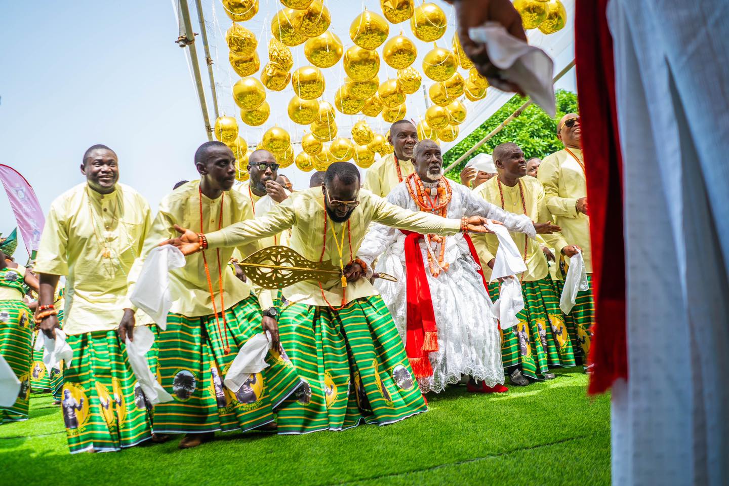 Okere community dancers dancing before Ogiame Atuwatse III